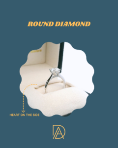 Side view of round diamond ring with hidden heart detail